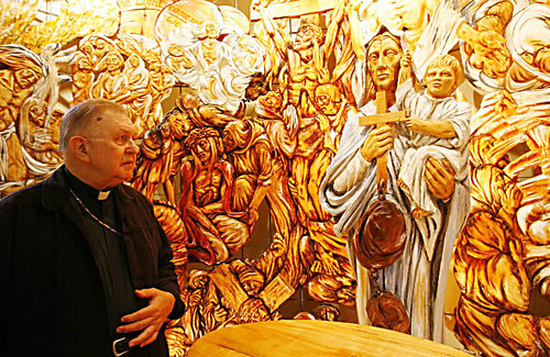 Bishop Thaddeus Peplowski of the Polish National Catholic Church admires the latest sculpture by the Rev. Walter Madej, the last piece of a 15-year project at Holy Mother of the Rosary Cathedral in Lancaster.